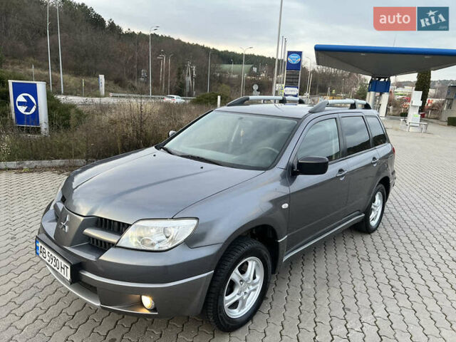 Серый Мицубиси Аутлендер, объемом двигателя 2 л и пробегом 196 тыс. км за 6450 $, фото 32 на Automoto.ua
