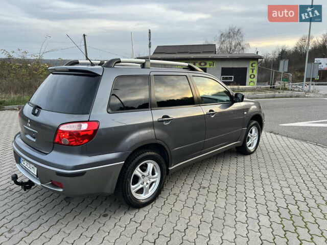 Сірий Міцубісі Аутлендер, об'ємом двигуна 2 л та пробігом 192 тис. км за 6400 $, фото 30 на Automoto.ua