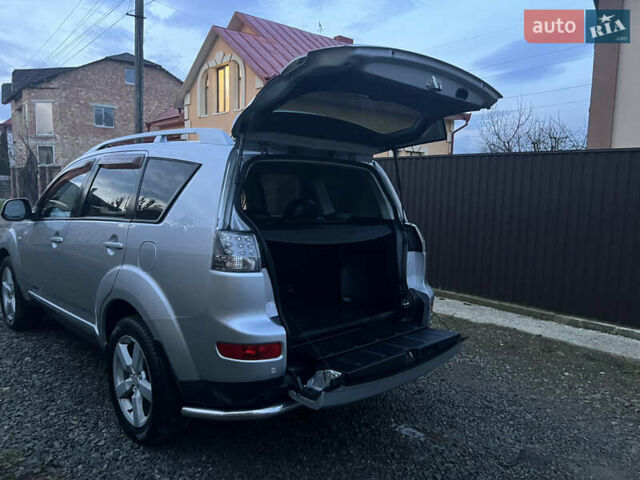Серый Мицубиси Аутлендер, объемом двигателя 2.4 л и пробегом 236 тыс. км за 7600 $, фото 28 на Automoto.ua