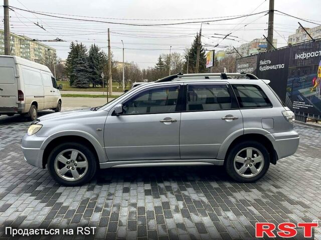 Серый Мицубиси Аутлендер, объемом двигателя 2.4 л и пробегом 280 тыс. км за 5800 $, фото 3 на Automoto.ua