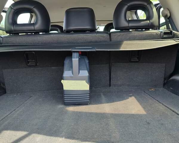 Серый Мицубиси Аутлендер, объемом двигателя 2.4 л и пробегом 23 тыс. км за 8300 $, фото 3 на Automoto.ua