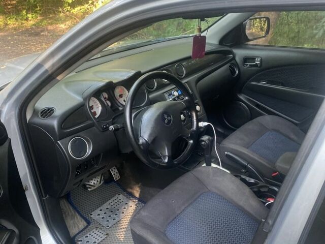 Сірий Міцубісі Аутлендер, об'ємом двигуна 2.4 л та пробігом 307 тис. км за 6700 $, фото 7 на Automoto.ua