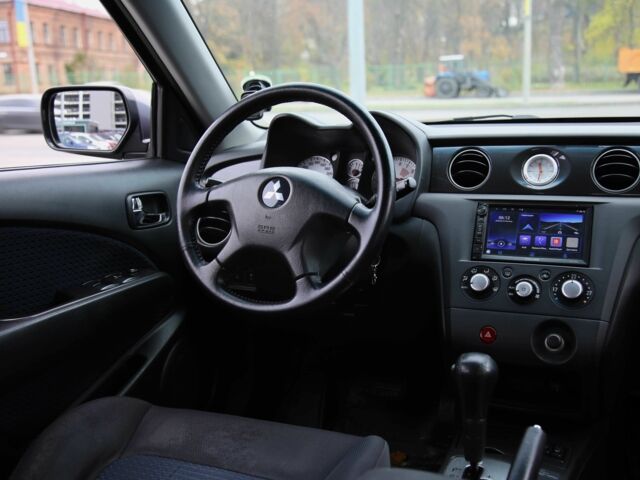 Серый Мицубиси Аутлендер, объемом двигателя 2.4 л и пробегом 240 тыс. км за 7200 $, фото 10 на Automoto.ua