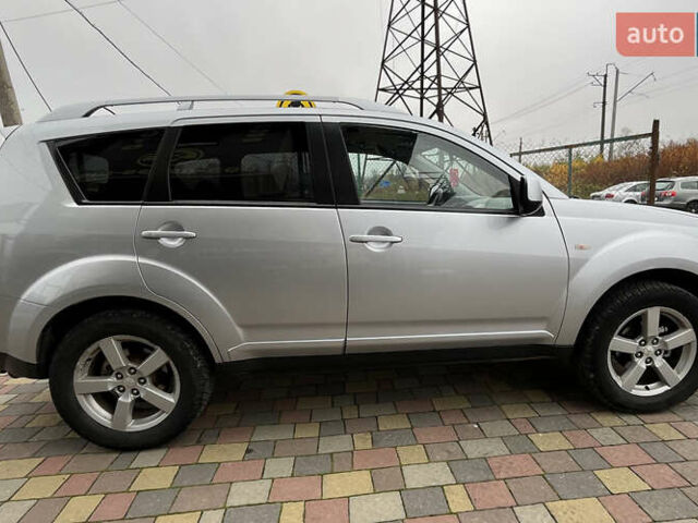 Серый Мицубиси Аутлендер, объемом двигателя 1.97 л и пробегом 310 тыс. км за 7600 $, фото 7 на Automoto.ua
