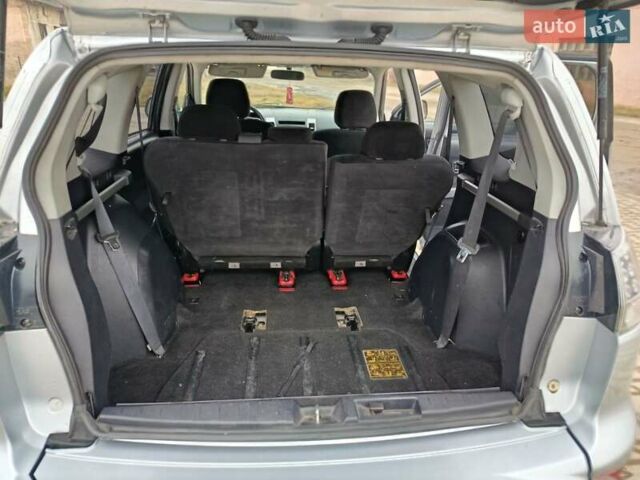 Серый Мицубиси Аутлендер, объемом двигателя 2 л и пробегом 332 тыс. км за 7650 $, фото 17 на Automoto.ua