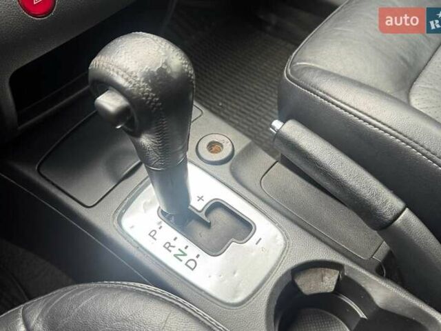 Серый Мицубиси Аутлендер, объемом двигателя 2.4 л и пробегом 245 тыс. км за 6790 $, фото 21 на Automoto.ua