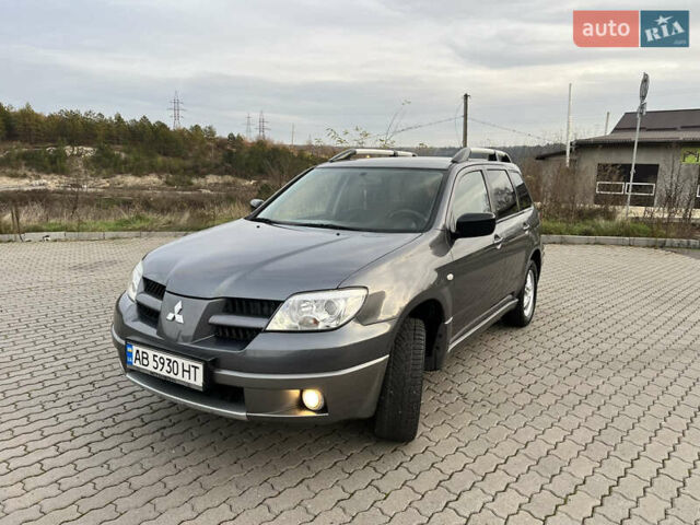 Серый Мицубиси Аутлендер, объемом двигателя 2 л и пробегом 196 тыс. км за 6450 $, фото 39 на Automoto.ua
