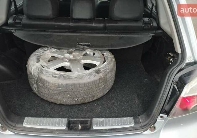 Серый Мицубиси Аутлендер, объемом двигателя 2.38 л и пробегом 204 тыс. км за 6100 $, фото 10 на Automoto.ua