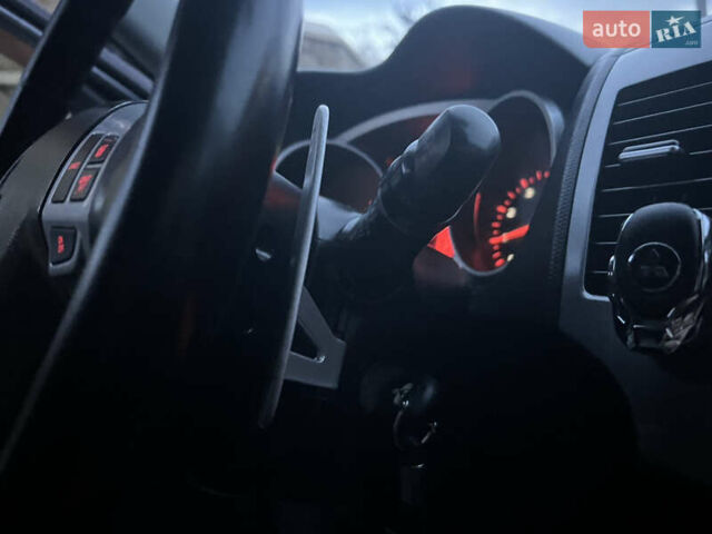 Серый Мицубиси Аутлендер, объемом двигателя 2.4 л и пробегом 236 тыс. км за 7600 $, фото 59 на Automoto.ua