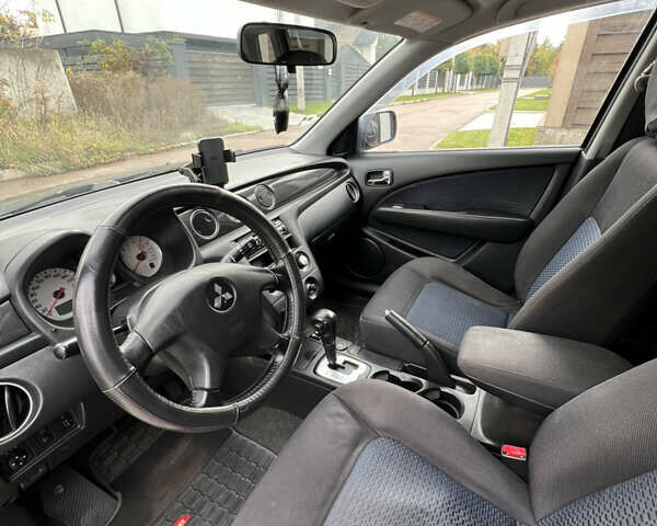 Мицубиси Аутлендер 2007 в Киеве на Automoto.ua Серый Мицубиси Аутлендер, объемом двигателя 2.4 л и пробегом 291 тыс. км за 6500 $, фото 28 на Automoto.ua