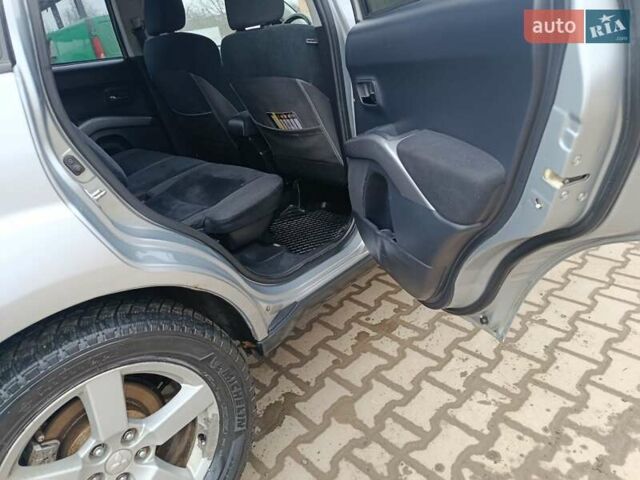 Серый Мицубиси Аутлендер, объемом двигателя 2 л и пробегом 332 тыс. км за 7650 $, фото 15 на Automoto.ua