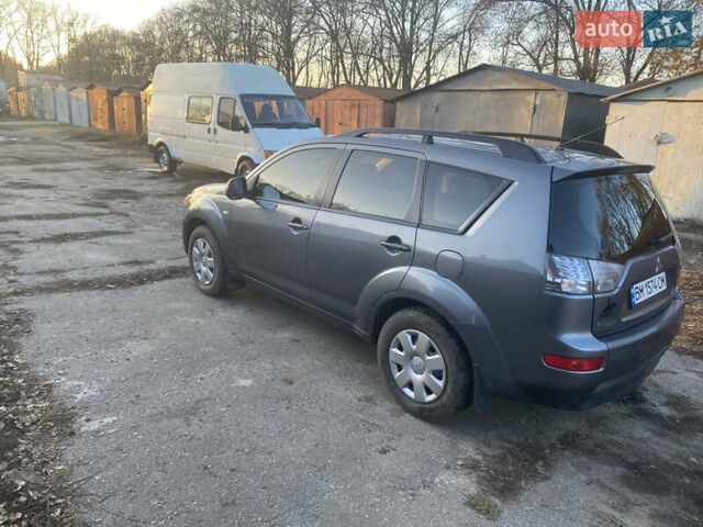 Серый Мицубиси Аутлендер, объемом двигателя 1.97 л и пробегом 257 тыс. км за 9000 $, фото 5 на Automoto.ua