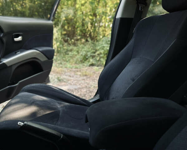 Сірий Міцубісі Аутлендер, об'ємом двигуна 2 л та пробігом 243 тис. км за 8600 $, фото 30 на Automoto.ua