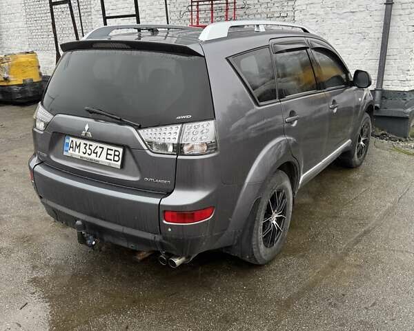 Серый Мицубиси Аутлендер, объемом двигателя 2 л и пробегом 260 тыс. км за 8400 $, фото 5 на Automoto.ua