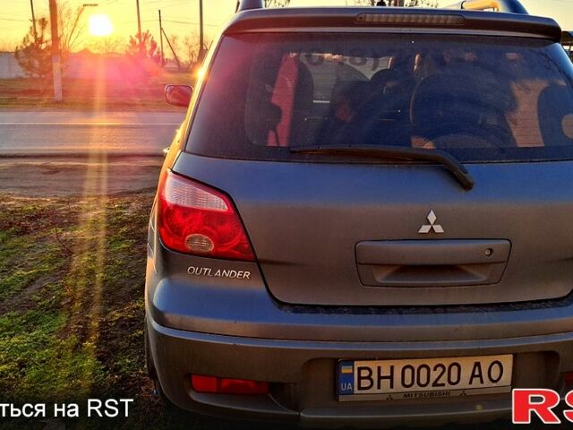 Сірий Міцубісі Аутлендер, об'ємом двигуна 2.4 л та пробігом 211 тис. км за 5000 $, фото 3 на Automoto.ua