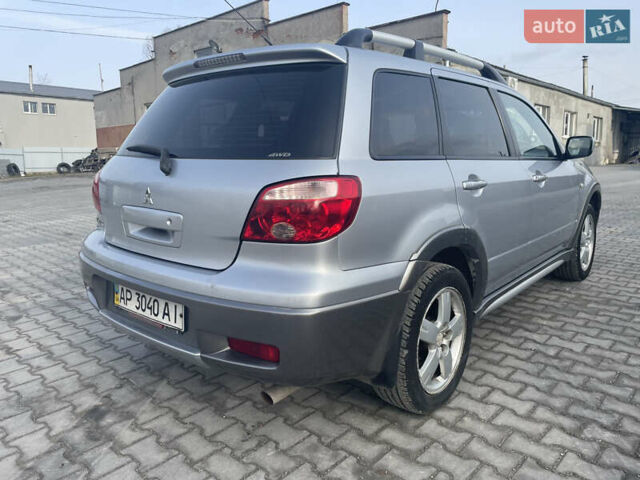 Сірий Міцубісі Аутлендер, об'ємом двигуна 2.4 л та пробігом 166 тис. км за 6700 $, фото 5 на Automoto.ua