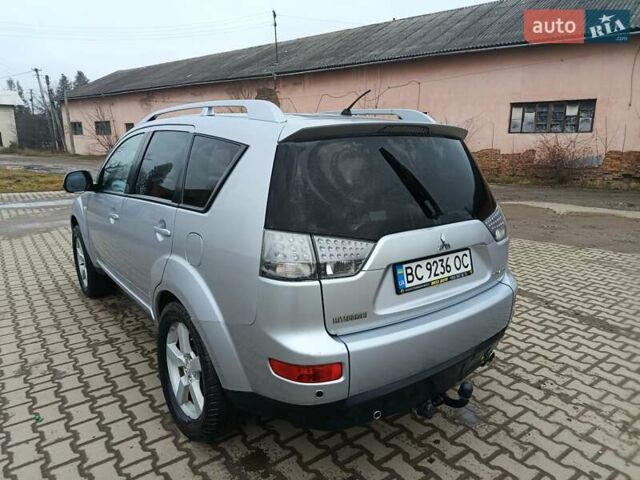 Серый Мицубиси Аутлендер, объемом двигателя 2 л и пробегом 332 тыс. км за 7650 $, фото 11 на Automoto.ua