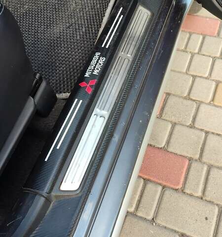 Серый Мицубиси Аутлендер, объемом двигателя 2.38 л и пробегом 189 тыс. км за 7600 $, фото 10 на Automoto.ua