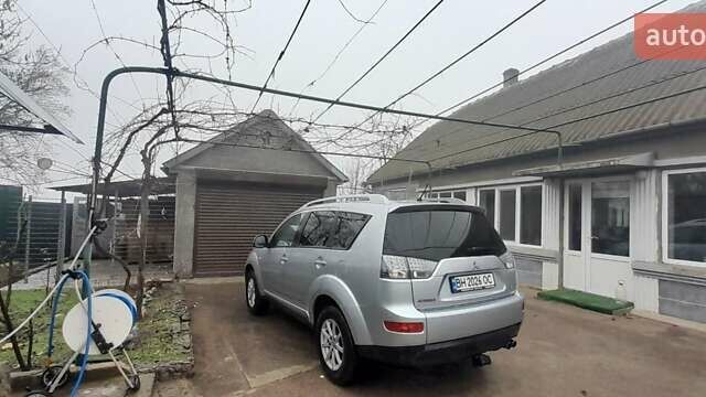 Сірий Міцубісі Аутлендер, об'ємом двигуна 1.97 л та пробігом 197 тис. км за 8999 $, фото 2 на Automoto.ua