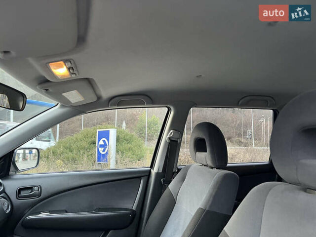 Серый Мицубиси Аутлендер, объемом двигателя 2 л и пробегом 196 тыс. км за 6450 $, фото 41 на Automoto.ua