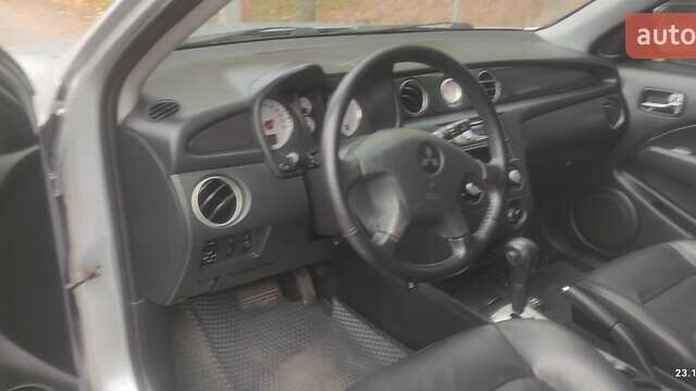 Сірий Міцубісі Аутлендер, об'ємом двигуна 2.38 л та пробігом 200 тис. км за 6550 $, фото 6 на Automoto.ua