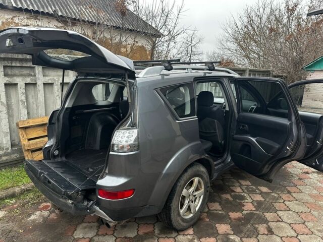 Сірий Міцубісі Аутлендер, об'ємом двигуна 2.4 л та пробігом 265 тис. км за 7000 $, фото 2 на Automoto.ua