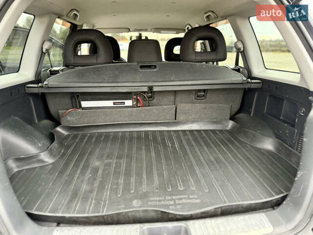 Серый Мицубиси Аутлендер, объемом двигателя 2 л и пробегом 199 тыс. км за 5999 $, фото 13 на Automoto.ua