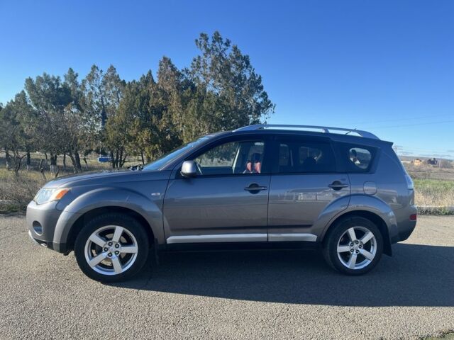 Серый Мицубиси Аутлендер, объемом двигателя 2.4 л и пробегом 213 тыс. км за 7800 $, фото 4 на Automoto.ua