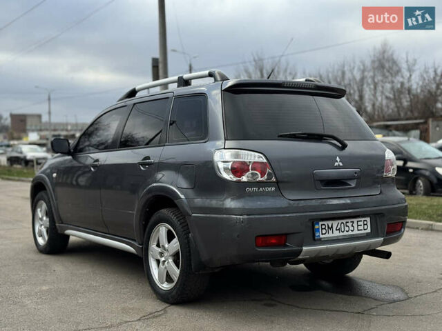 Серый Мицубиси Аутлендер, объемом двигателя 2.38 л и пробегом 254 тыс. км за 7300 $, фото 10 на Automoto.ua
