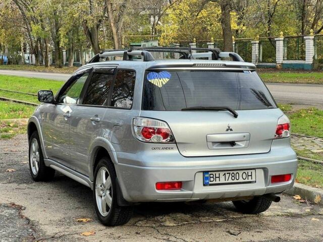Серый Мицубиси Аутлендер, объемом двигателя 2.4 л и пробегом 170 тыс. км за 6900 $, фото 5 на Automoto.ua