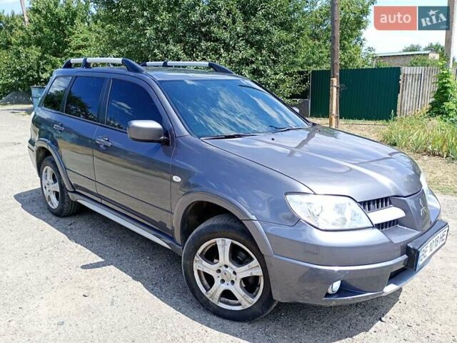 Серый Мицубиси Аутлендер, объемом двигателя 2.35 л и пробегом 342 тыс. км за 6900 $, фото 8 на Automoto.ua