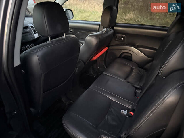 Сірий Міцубісі Аутлендер, об'ємом двигуна 2 л та пробігом 235 тис. км за 8950 $, фото 75 на Automoto.ua