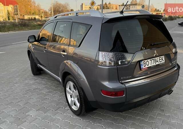 Серый Мицубиси Аутлендер, объемом двигателя 2.4 л и пробегом 174 тыс. км за 9599 $, фото 6 на Automoto.ua