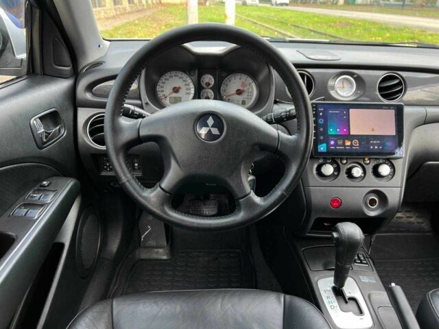 Серый Мицубиси Аутлендер, объемом двигателя 2.4 л и пробегом 170 тыс. км за 6900 $, фото 14 на Automoto.ua