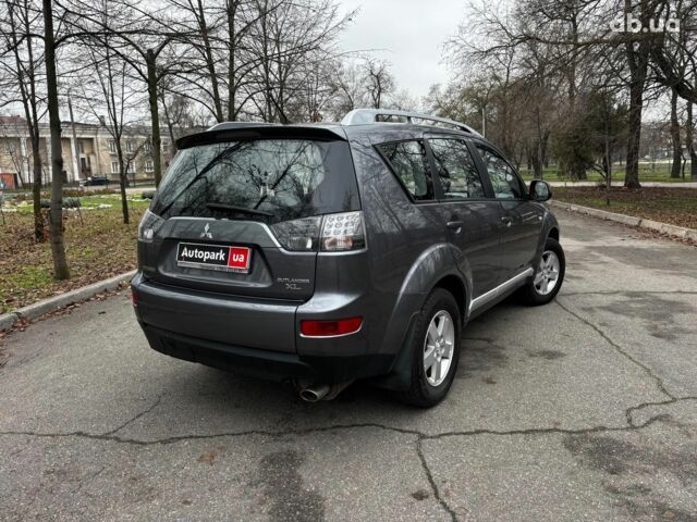 Серый Мицубиси Аутлендер, объемом двигателя 2.4 л и пробегом 237 тыс. км за 8490 $, фото 6 на Automoto.ua