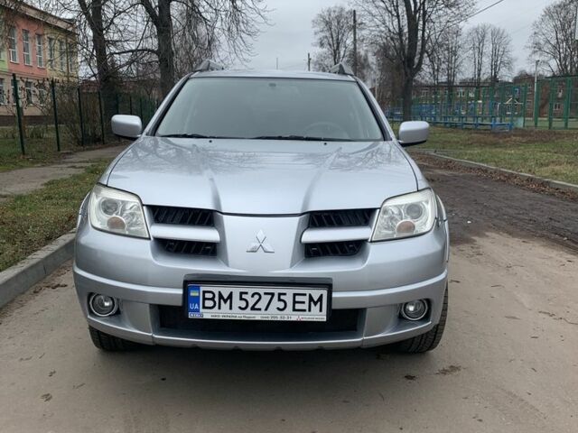 Серый Мицубиси Аутлендер, объемом двигателя 2 л и пробегом 247 тыс. км за 5999 $, фото 5 на Automoto.ua