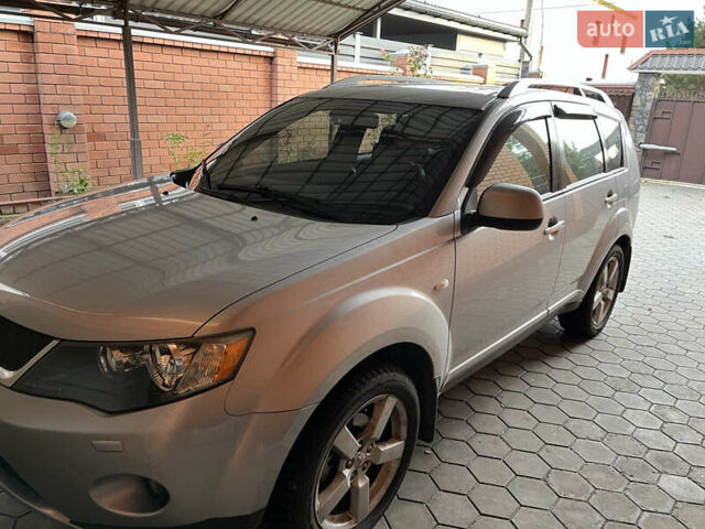 Сірий Міцубісі Аутлендер, об'ємом двигуна 2.36 л та пробігом 195 тис. км за 9500 $, фото 5 на Automoto.ua