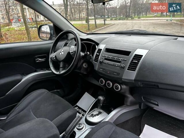 Серый Мицубиси Аутлендер, объемом двигателя 2.4 л и пробегом 237 тыс. км за 8490 $, фото 17 на Automoto.ua