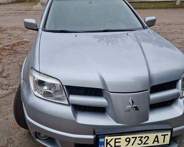 Серый Мицубиси Аутлендер, объемом двигателя 2.38 л и пробегом 113 тыс. км за 8900 $, фото 9 на Automoto.ua