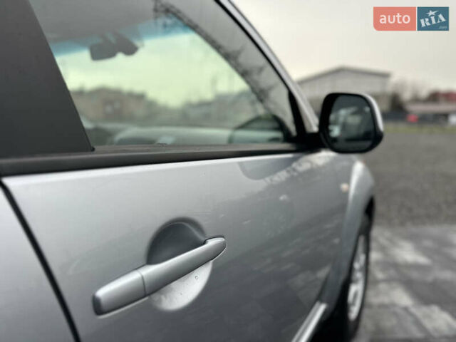 Серый Мицубиси Аутлендер, объемом двигателя 2.4 л и пробегом 61 тыс. км за 11300 $, фото 30 на Automoto.ua