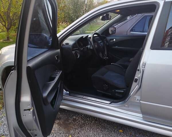 Сірий Міцубісі Аутлендер, об'ємом двигуна 2.38 л та пробігом 209 тис. км за 7460 $, фото 7 на Automoto.ua