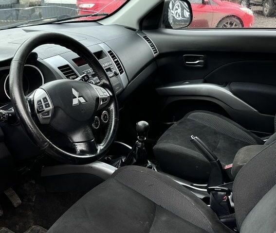 Серый Мицубиси Аутлендер, объемом двигателя 2 л и пробегом 339 тыс. км за 4949 $, фото 6 на Automoto.ua