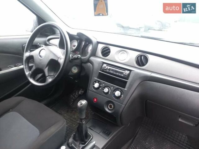 Серый Мицубиси Аутлендер, объемом двигателя 2 л и пробегом 232 тыс. км за 5950 $, фото 6 на Automoto.ua