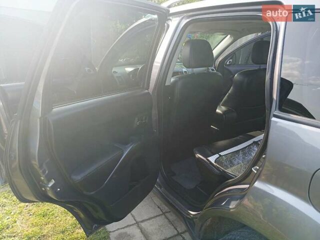 Сірий Міцубісі Аутлендер, об'ємом двигуна 2.18 л та пробігом 270 тис. км за 9800 $, фото 11 на Automoto.ua