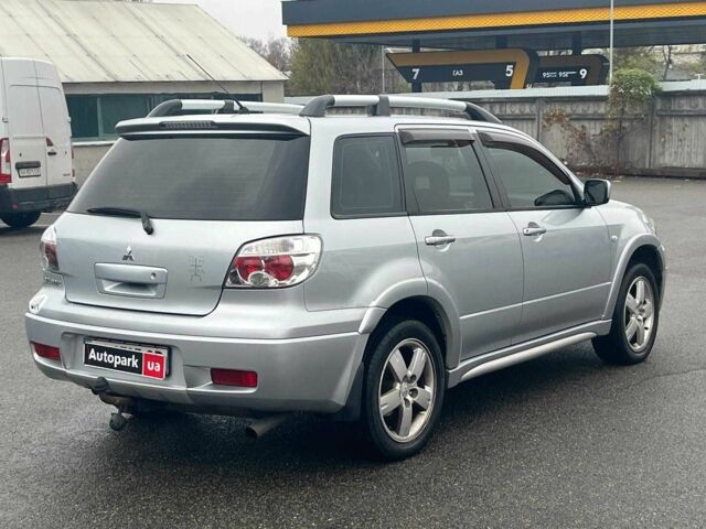 Сірий Міцубісі Аутлендер, об'ємом двигуна 2.4 л та пробігом 324 тис. км за 6890 $, фото 11 на Automoto.ua