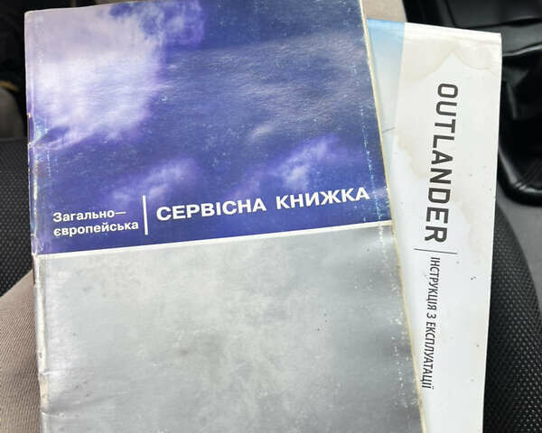 Серый Мицубиси Аутлендер, объемом двигателя 2 л и пробегом 209 тыс. км за 7200 $, фото 28 на Automoto.ua