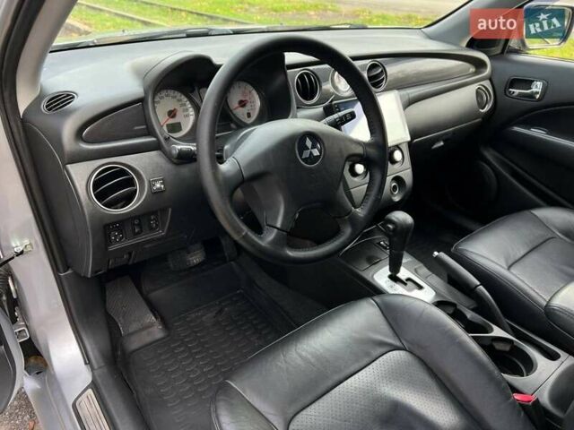 Серый Мицубиси Аутлендер, объемом двигателя 2.38 л и пробегом 170 тыс. км за 6900 $, фото 11 на Automoto.ua