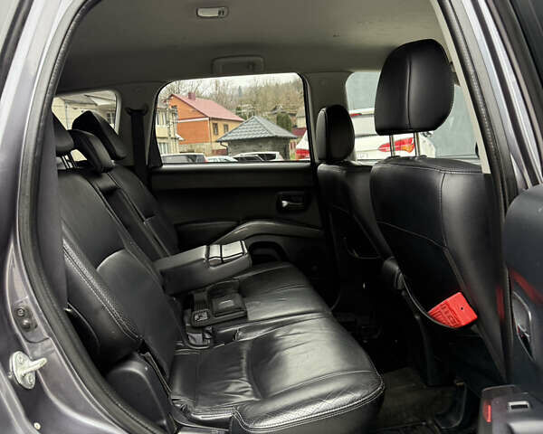 Сірий Міцубісі Аутлендер, об'ємом двигуна 2 л та пробігом 237 тис. км за 8999 $, фото 43 на Automoto.ua