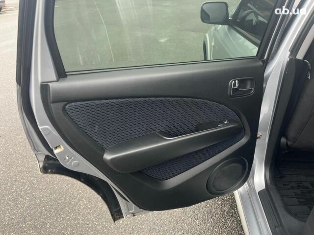 Серый Мицубиси Аутлендер, объемом двигателя 2.4 л и пробегом 324 тыс. км за 6890 $, фото 24 на Automoto.ua