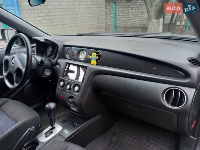 Серый Мицубиси Аутлендер, объемом двигателя 2.38 л и пробегом 143 тыс. км за 7300 $, фото 18 на Automoto.ua